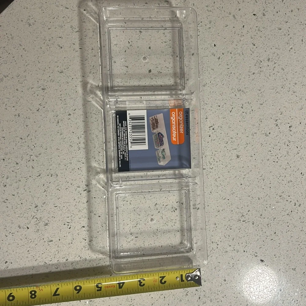 3 plastic organizers by Essentials.  All three are identical. Made in China.